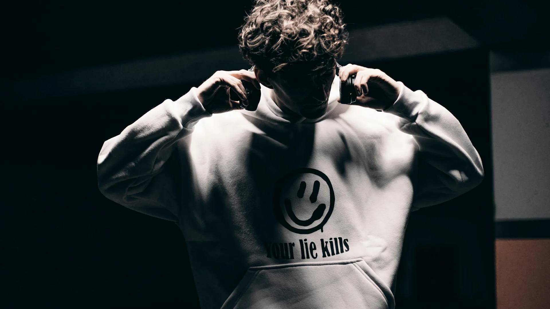 HVAC technician servicing outdoor AC condenser unit during annual maintenance